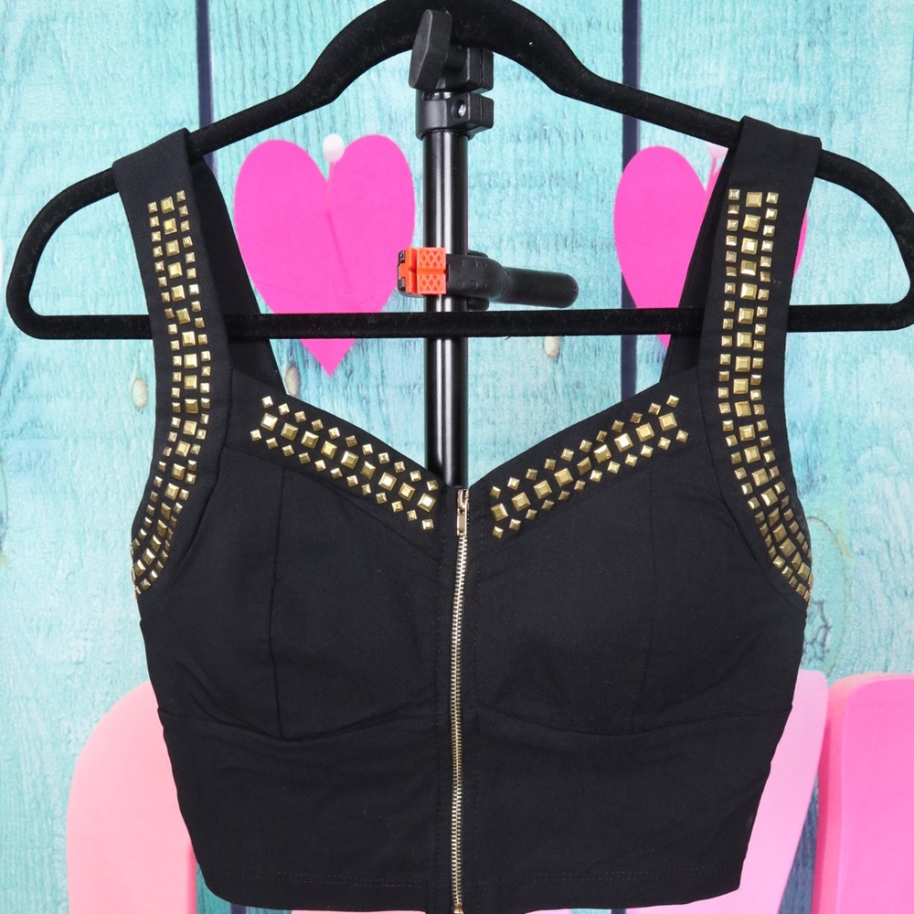 Black studded gold crop top.